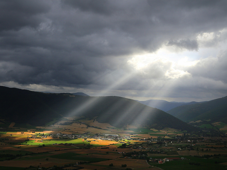 Rays of sunlight bursting through the clouds as if you're nourishing your soul by connecting to spirit